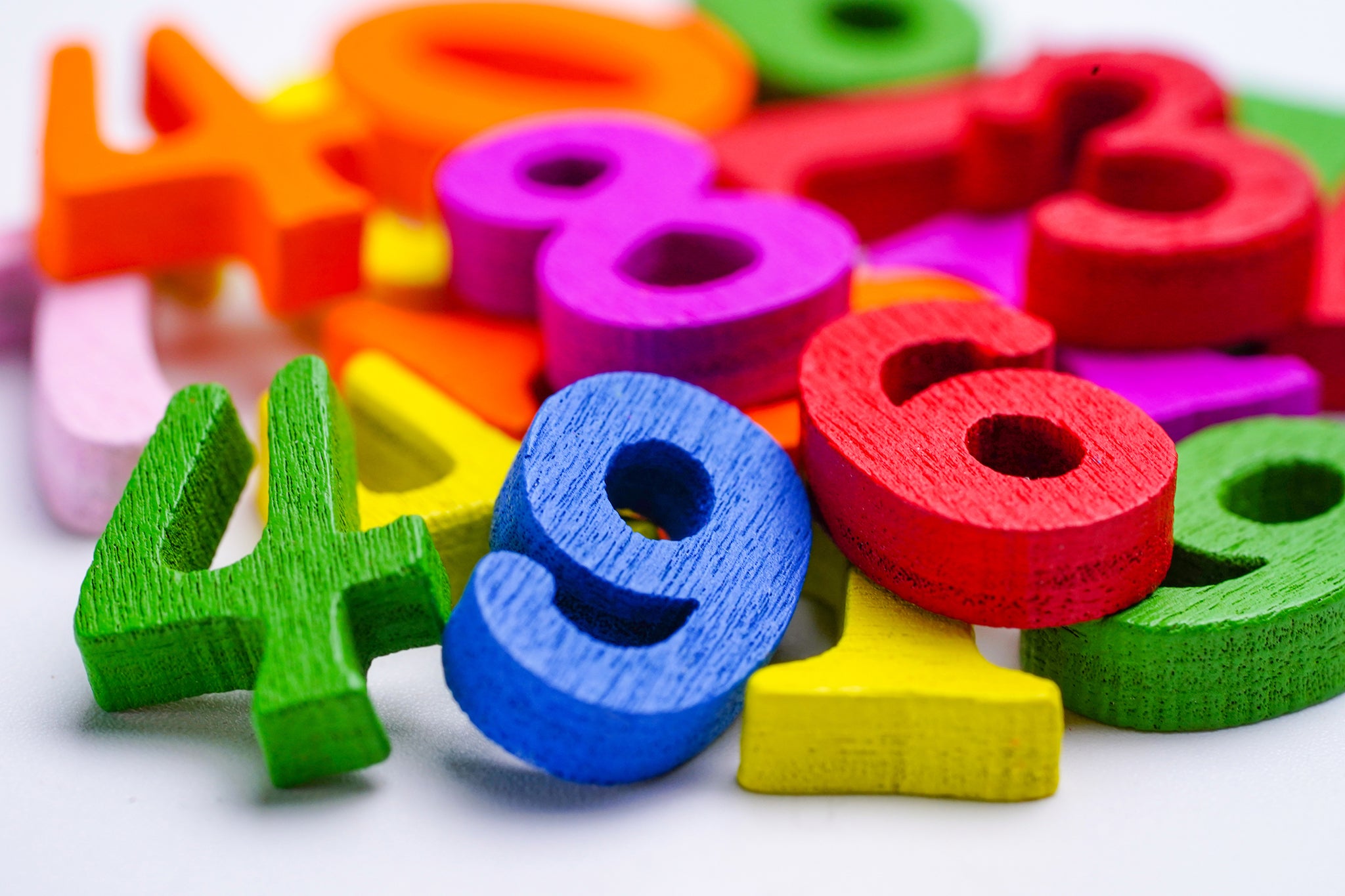 Number blocks scattered on a table