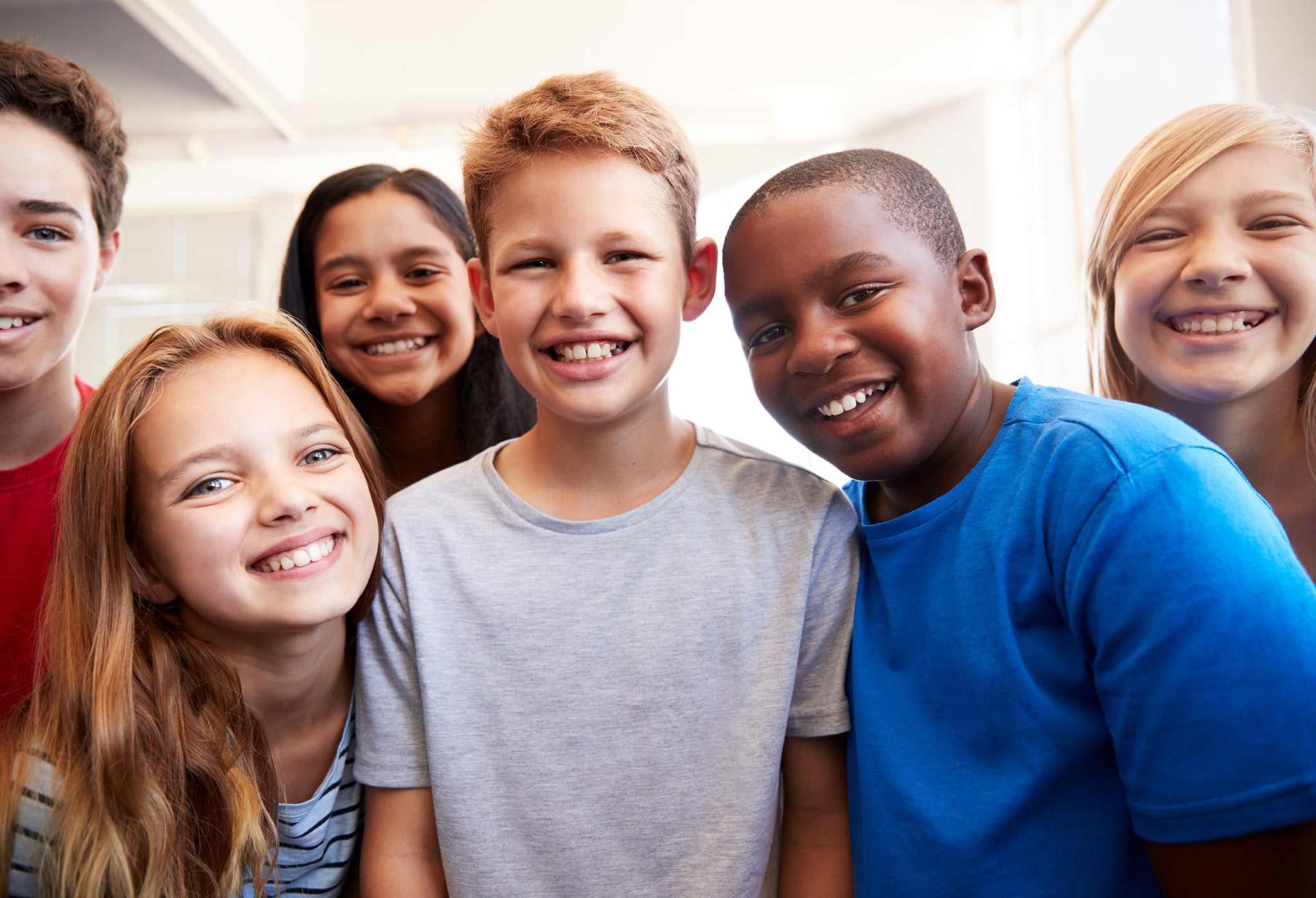 Group of smiling middle school children